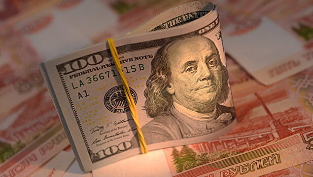 Глава ВТБ: курс доллара к концу года может достигнуть 62 рубля