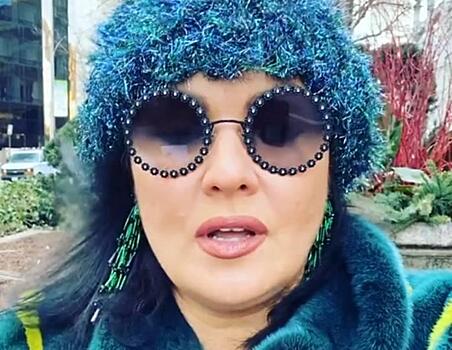 Нетребко в неоново-лимонных кроссовках и брюках с лампасами прогулялась по Мюнхену