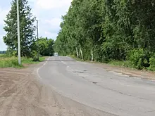 Новосибирских депутатов провезли по разбитой дороге в автобусе без кондиционера