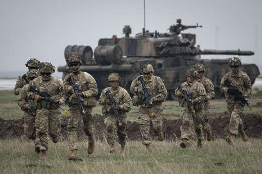 Поверенный Зыков: НАТО продолжает курс на приближение к российским границам