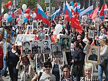 Почему британцы приехали в Москву на акцию "Бессмертный полк"