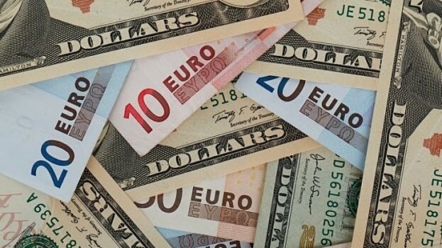 ЦБ РФ установил курс доллара США с 21 июня в размере 63,3877 руб.