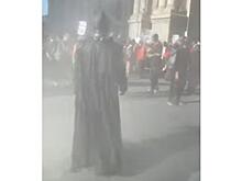 На массовых митингах в США появился Бэтмен