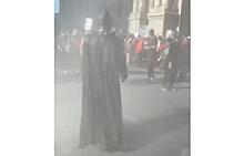 На массовых митингах в США появился Бэтмен