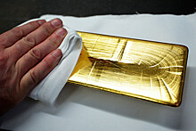 Финам: в базовом сценарии к концу 2024 года цена унции золота составит $2070