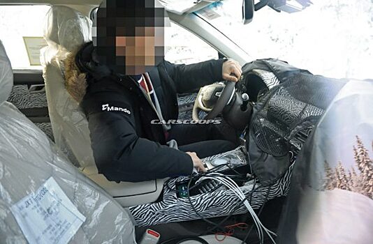 Первый кроссовер Genesis показал салон