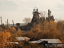 Город-призрак в тени заводской трубы