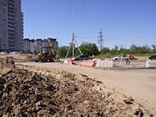 На волгоградской 3-й продольной начали укладывать финишный слой асфальта