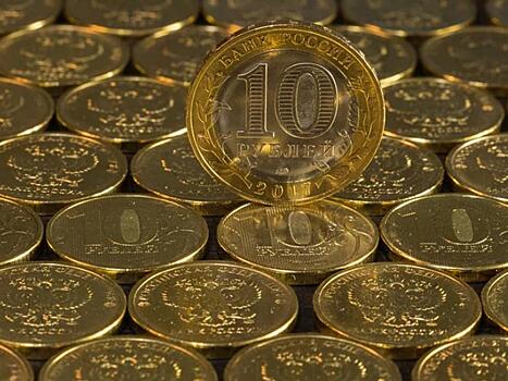 Рубль на старте торгов укрепился к доллару и евро