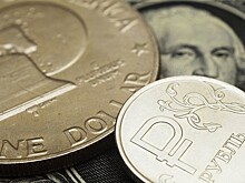 Рубль растёт к доллару и евро