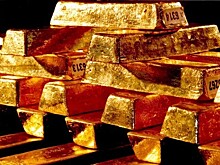 Золото дешевеет в ожидании повышения ставки ФРС