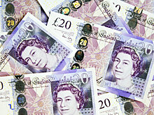 Британский фунт остановил снижение к доллару