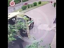 Ограбление инкассаторов с перестрелкой в российском городе попало на видео