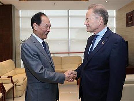 Цай Минчжао встретился с генеральным директором Отделения ООН в Женеве Михаэлем Меллером
