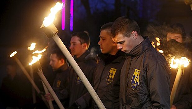 Бойцы "Азова" факелами почтили память жертв терактов в Бельгии