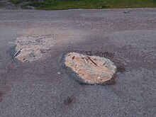 "Отремонтированная" опилками дорога появилась в Кемерове