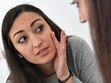 Названы наиболее частые проявления омикрона на коже