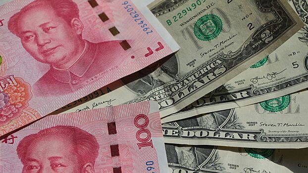 Американист Дудаков усомнился в способности юаня потеснить доллар на мировой арене