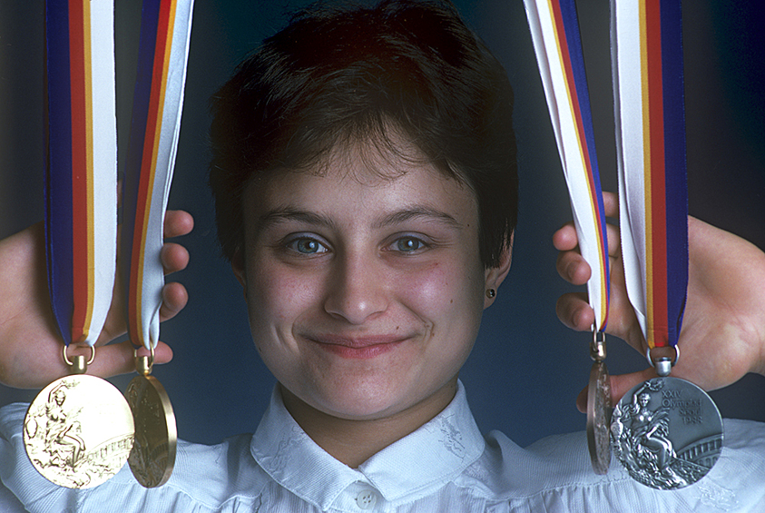 Елена Шушунова — одна из сильнейших гимнасток мира второй половины 1980-х. Пик ее карьеры пришелся на Игры-1988 в Сеуле: там она взяла четыре медали, две из которых — золотые (команда и многоборье). Также на счету Шушуновой пять золотых медалей с чемпионатов мира. 