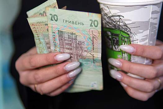 Bloomberg: МВФ требует от Украины провести девальвацию гривны