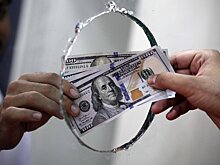 Курс доллара вырос до 82,7 рубля