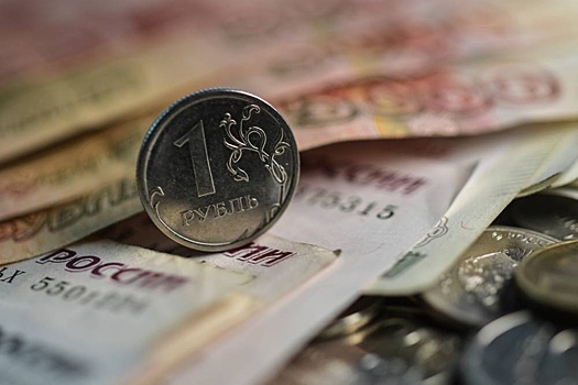 Рубль спокойно отреагировал на решение Банка России по ключевой ставке