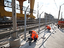 На мосту через Волжскую ГЭС кладут последние 442 метра асфальта