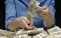 Экономист: США могут способствовать возврату РФ к расчетам в долларах