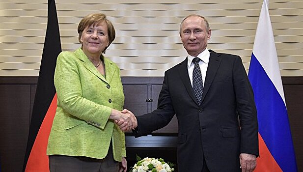 Путин и Меркель осудили поведение КНДР
