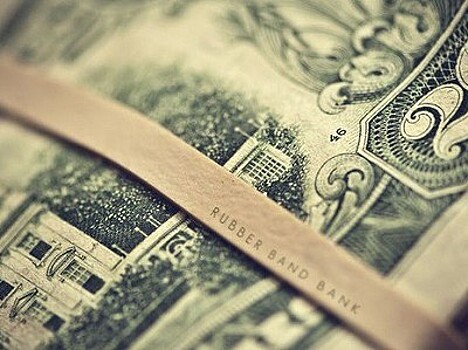 Курс доллара рухнул ниже 60 рублей