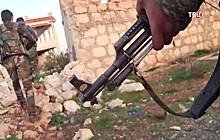 В Сирии группа из 65 боевиков сложила оружие