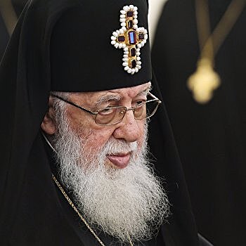 Крест на лбу кровью