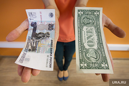 Брокеры прогнозируют 100 рублей за доллар