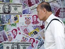 Курс юаня упал до минимума за год