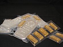 ФРС ослабила доллар и поддержала золото