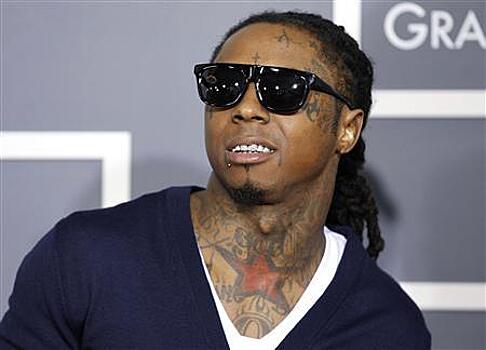 Lil Wayne продал виллу с аквариумом для акул