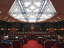 КС РФ постановил уточнить правила регулирования рынка электроэнергии