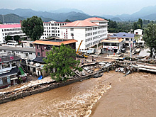 В Пекине из-за ливней погибли по меньшей мере 30 человек