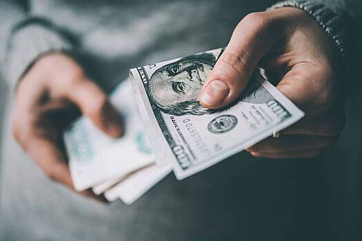 Курс доллара поднялся выше 86 рублей