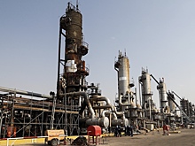 Нефть остается под давлением из-за Китая и доллара