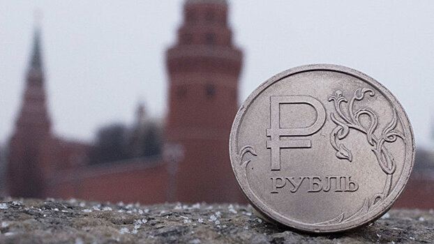 Рубль вечером стабилизировался к доллару и евро
