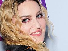 Мадонна скрывает усыновленных ей близнецов