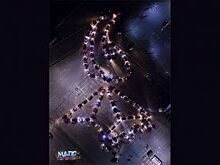 В Воронеже сфотографировали огромный Вечный огонь, составленный из машин