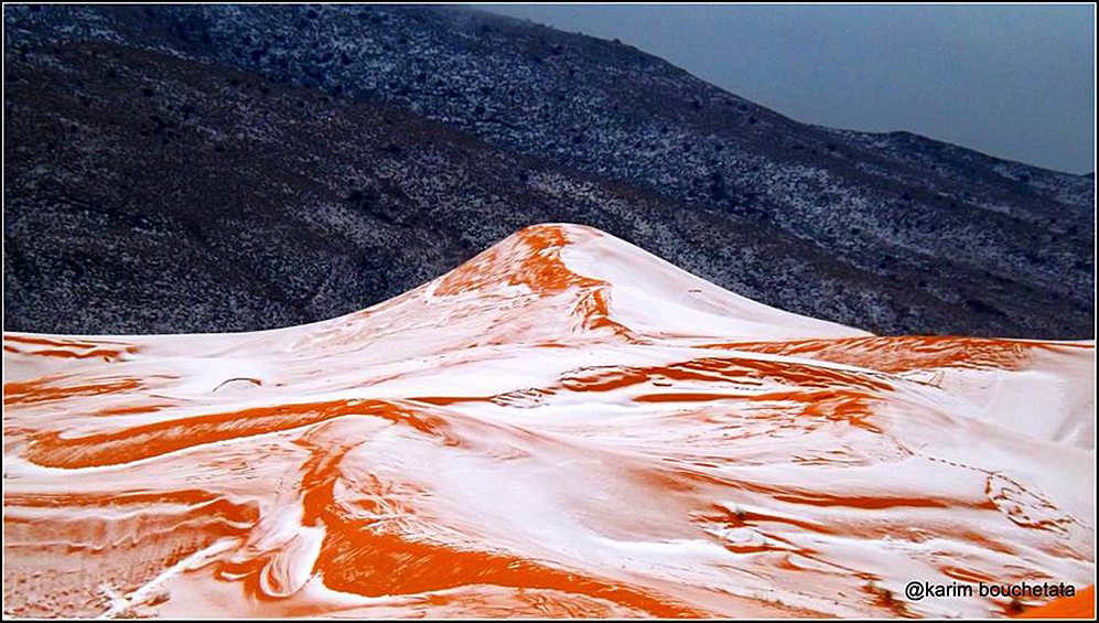 В африканской пустыне Сахара впервые с 1979 года выпал снег. Снимки природного явления в алжирском городе Айн-Сефра сделал фотограф-любитель Карим Бушетата. На фотографиях Бушетата видно, как снег тонким слоем покрывает оранжевые дюны. По словам фотографа, он продержался около суток. «Все были ошеломлены увидеть снег, выпадающий в пустыне, — это очень редкое явление», — написал Бушетата. Последний раз снег выпал в городе Айн-Сефра в 1979 году, когда на него обрушился получасовой снежный шторм