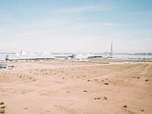 Девушка в песках: фотопроект Ники Кравченко о жизни на намывной территории