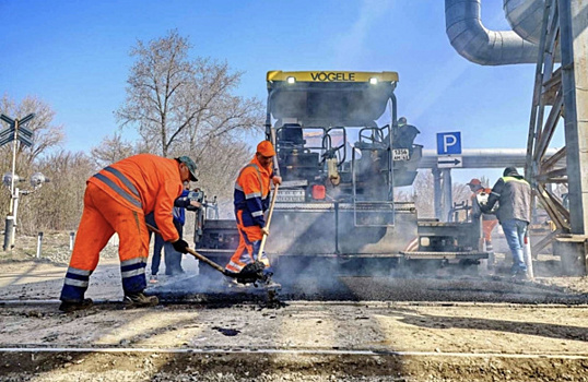 На улице Береговой в Самаре начали укладывать асфальт
