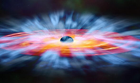 Сделана первая в истории фотография черной дыры