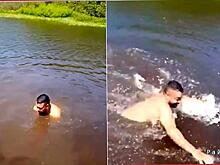 Купающийся в реке экстремал привлёк внимание крокодила