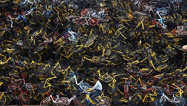 «Горшочек, не вари!»: как прокатные велосипеды наводнили Китай