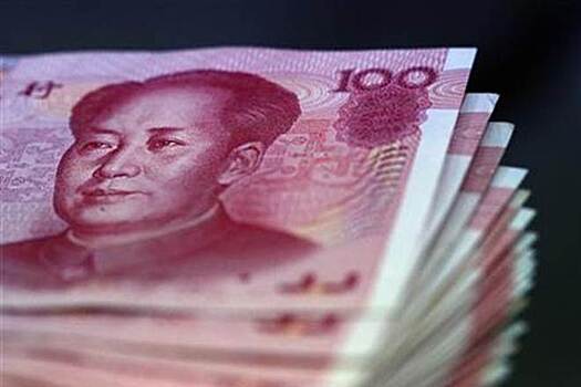 Китайский юань достиг годовых минимумов